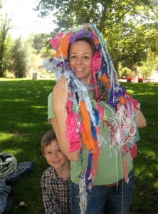Chester & Maggie Help rehang Our Village Wind Mobile