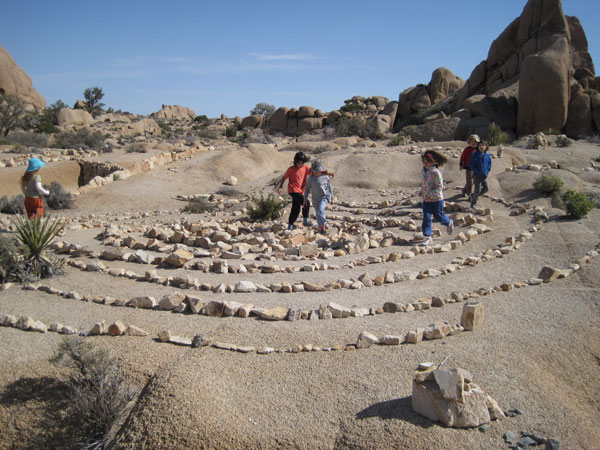 A Spiral Labyrinth to walk: By order of our children, you had to walk in and then out of the spiral before you attempted to make your own immortal work of art with the scattered rocks.