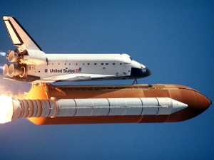 space shuttle and rocket